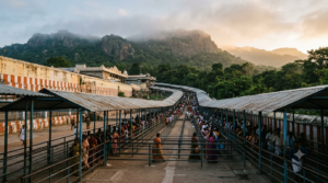 Tirumala 50 Rs darshan ticket guide showing pilgrims at the TTD queue complex entrance