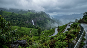 Monsoon destinations South India: misty green Western Ghats hills in the rain